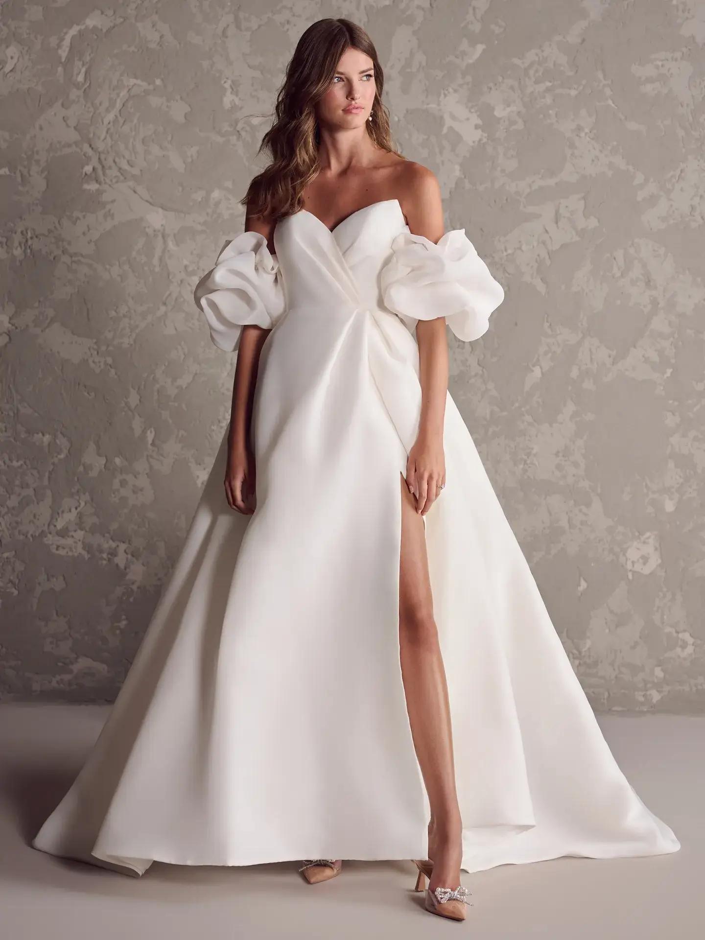 Exploring Creative Sleeve Styles in Modern Wedding Dresses Image